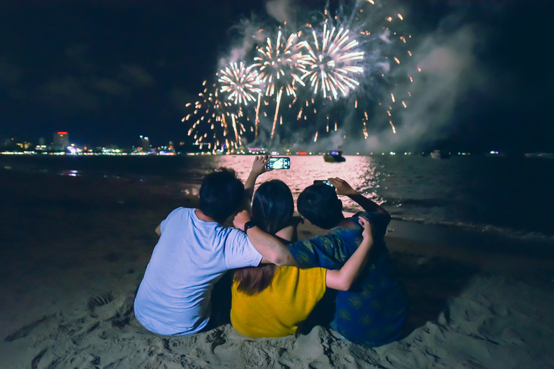 Three friends take a selfie on the beach at one of these 4th of July events in Florida. 