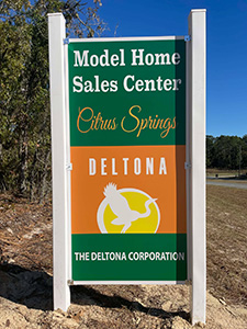 and then like Homes by Deltona Citrus Springs Model Home Sales Center Sign